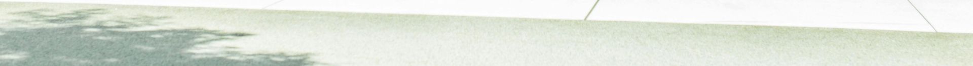 Contemporary café with glass walls showcasing a sleek interior design in Cupertino, California.